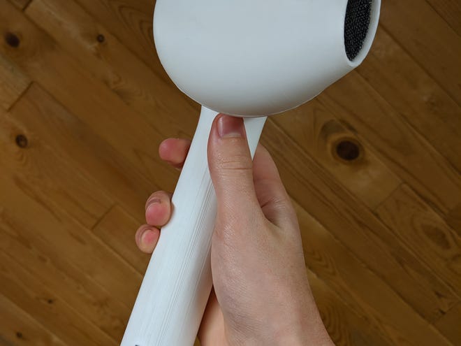 This Giant Airpod Replica Looks Like A Fancy Hair Dryer