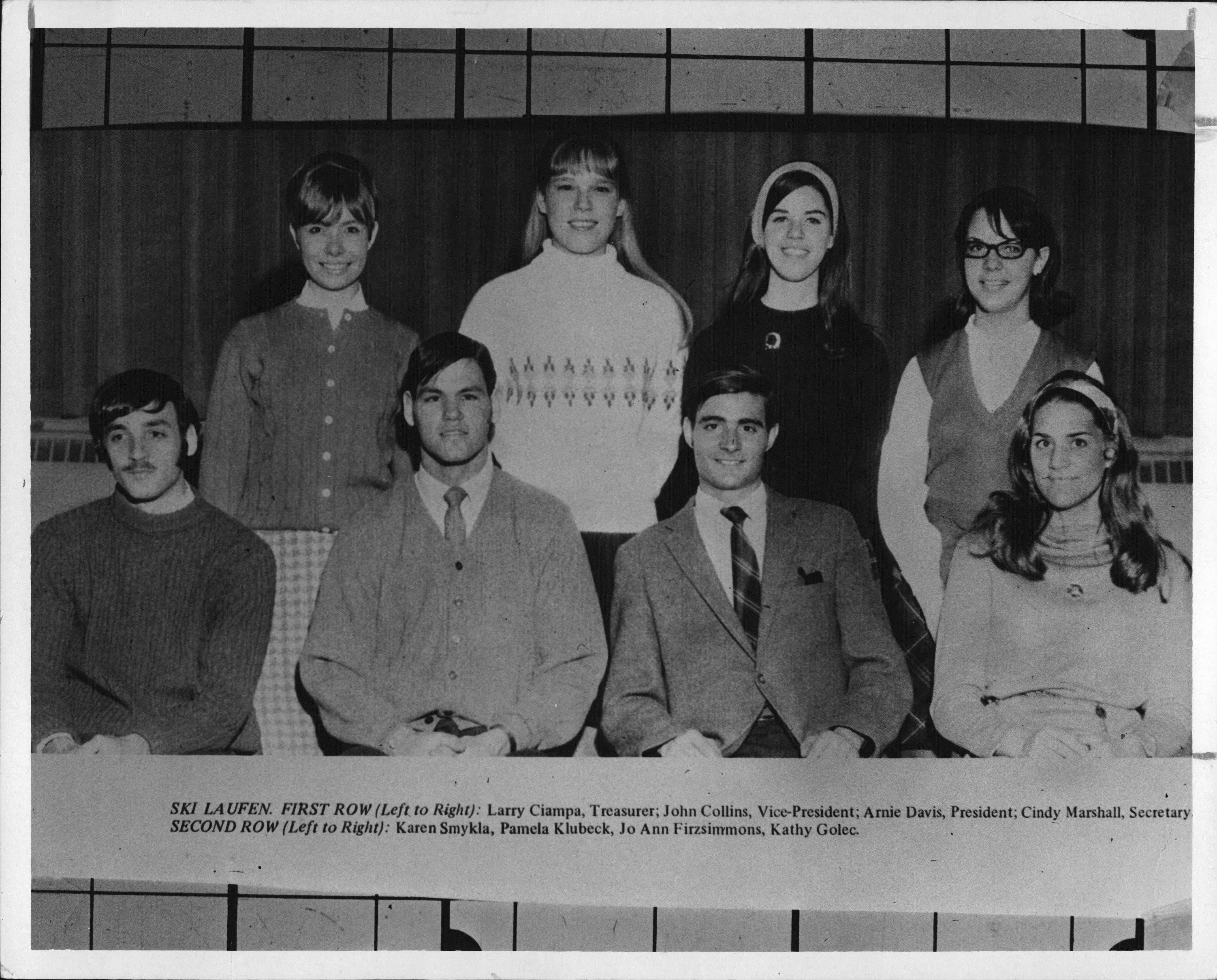 Eastern Michigan University Ski Laufen club vice president John Collins, second from left, sits next to club president Arnie Davis in this club photo from 1967.