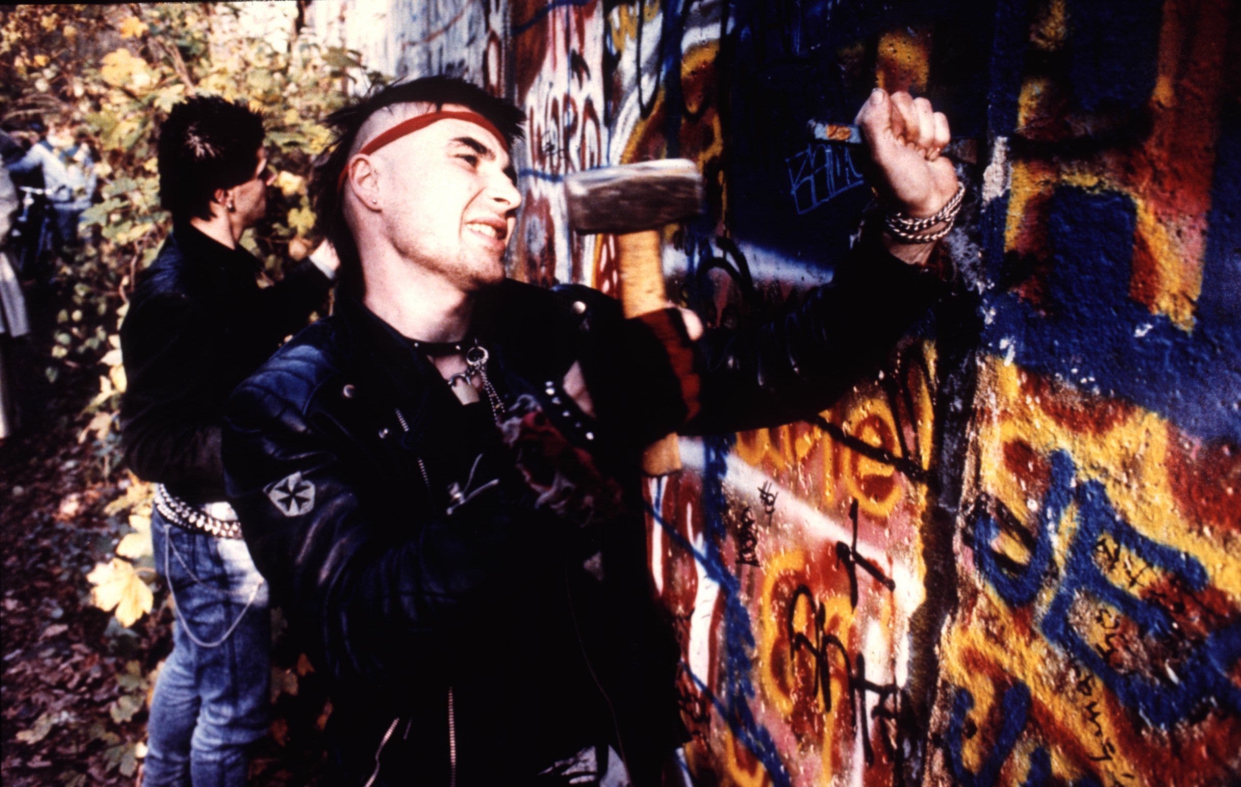 A West German takes hammer and chisel to the Berlin Wall on Nov. 11, 1989, in the midst of the euphoria that reigned for days after East German authorities opened the gates on Nov. 9. The wall, which was erected in 1961, became the ultimate symbol of the Iron Curtain dividing Eastern Europe from the West. The wall's fall was hailed around the world as a victory for freedom and democracy.