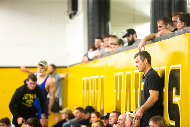 Iowa head coach Tom Brands watches a match during the second day of preseason Hawkeye wrestling matches, Friday, Nov., 8, 2019, inside the Dan Gable Wrestling Complex at Carver-Hawkeye Arena in Iowa City, Iowa.
