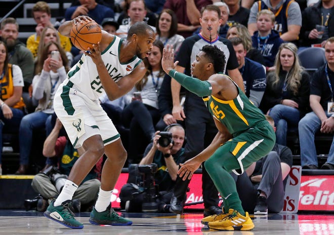Khris Middleton and the Bucks fell to the Jazz, 115-111, in Salt Lake City in March.