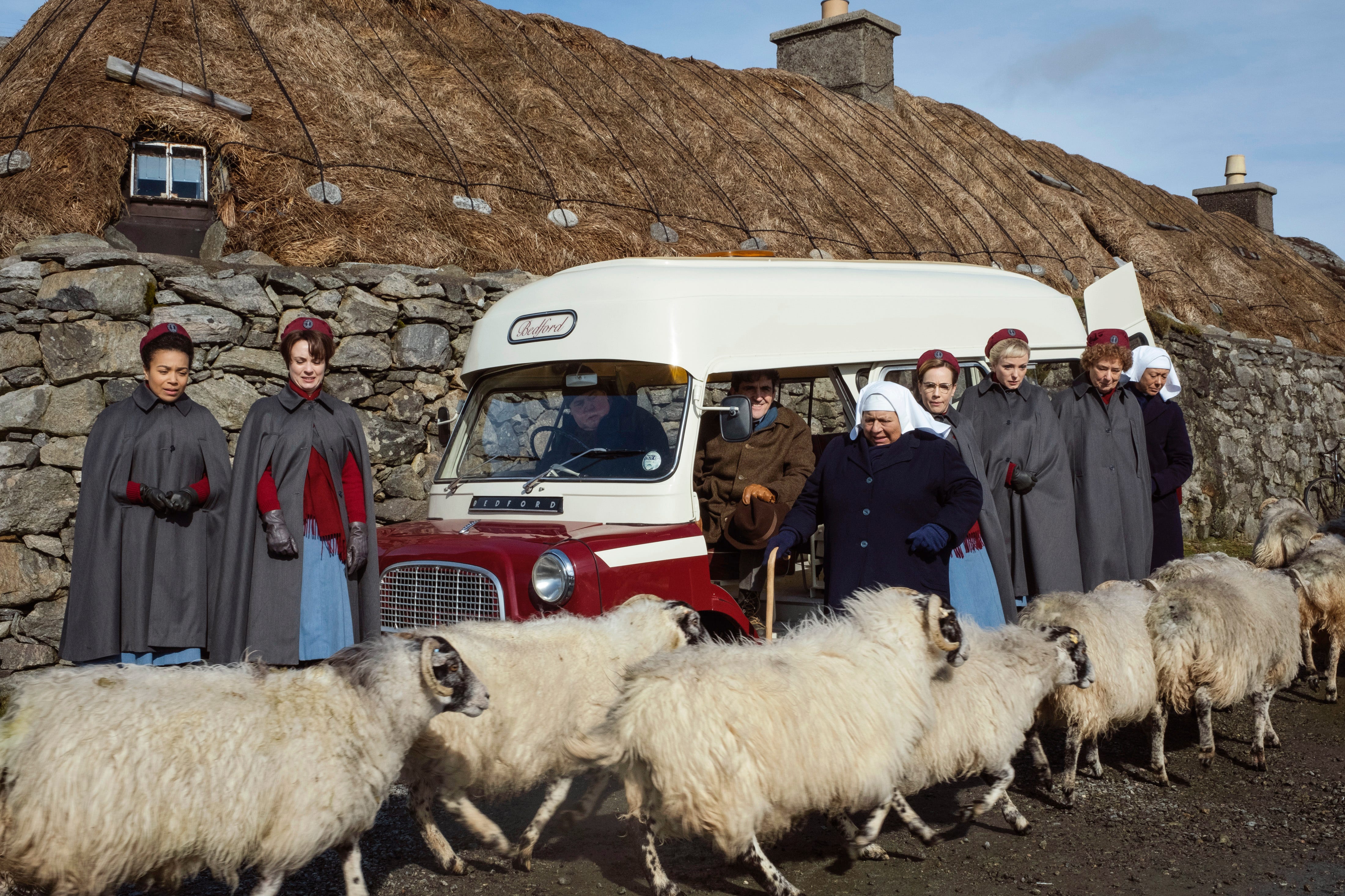 The Outer Hebrides is the destination for the 2019 edition of the "Call the Midwife" Christmas special. The cast includes, besides the woolly friends in the foreground, from left: Leonie Elliott, Jennifer Kirby, Cliff Parisi, Stephen McGann, Miriam Margoyles, Laura Main, Helen George, Linda Bassett and Jenny Agutter.