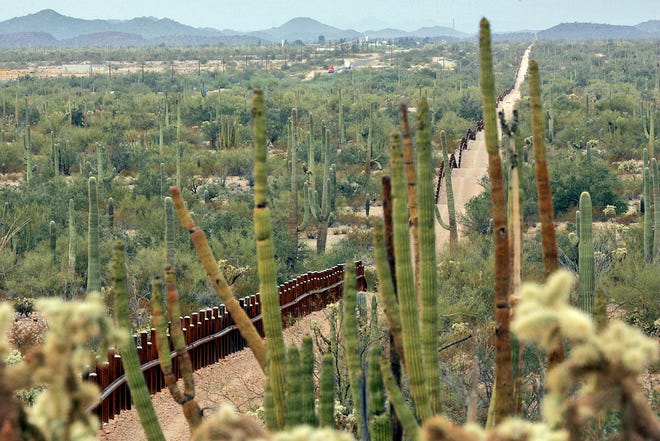 A border fence separates Arizona with Sonoyta, Mexico.