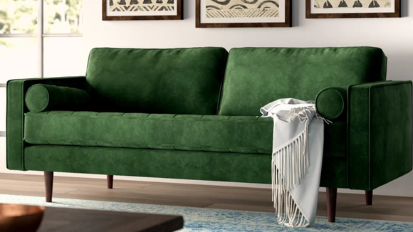 You'll want to sink into this velvet sofa for hours.