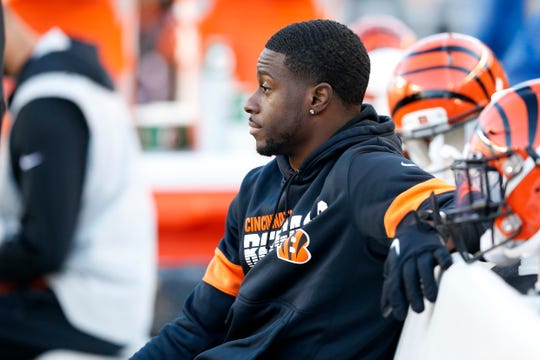 Injured Cincinnati Bengals wide receiver A.J. Green (18) watches from the bench in the fourth quarter of the NFL Week 10 game between the Cincinnati Bengals and the Baltimore Ravens at Paul Brown Stadium in downtown Cincinnati on Sunday, Nov. 10, 2019. The Bengals fell 49-13 to the Ravens and remain winless on the season. 