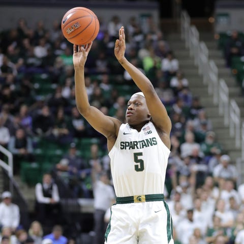 Michigan State Spartans guard Cassius Winston hits