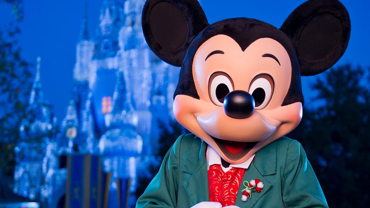 Mickey Mouse takes front and center during the holiday celebration at the Magic Kingdom in Disney World.