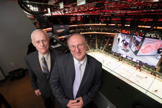 Color commentator Paul Woods, left, and play-by-play announcer Ken Kal were finishing their 25th season calling Red Wings games before the NHL season was suspended.