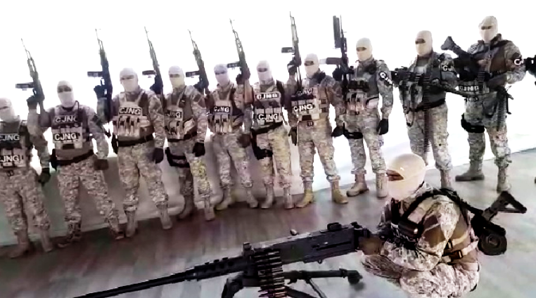 In social media posts, CJNG shows off its military-grade fire power, some of which is illegally bought in the U.S.