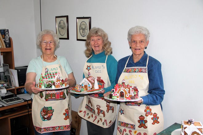 Dana Ridge, Rae Keeney and Mildred Toon show off some of the gingerbread houses they have made this year.

They are with the Order of the Eastern Star #11 and since 1978 they have made gingerbread houses that they sell as a fundraiser for charities and scholarships.
