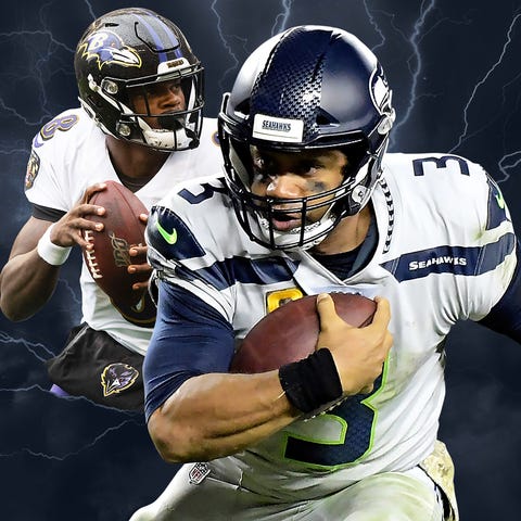 Seahawks QB Russell Wilson (3) and Ravens QB Lamar