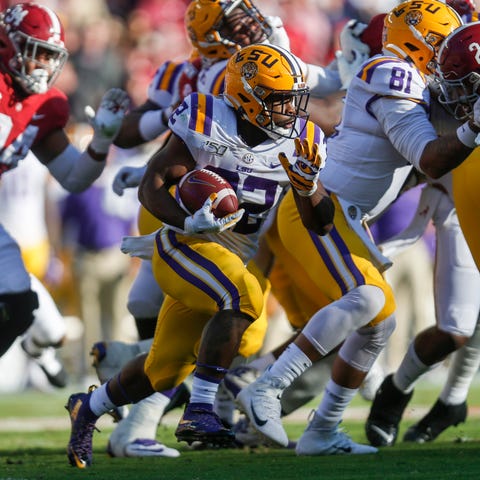 LSU running back Clyde Edwards-Helaire carries the