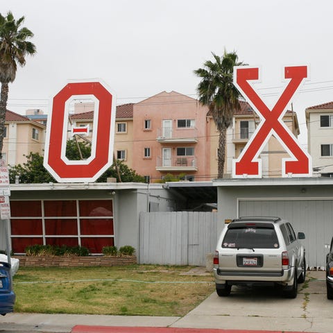 This file photo shows the Theta Chi fraternity hou