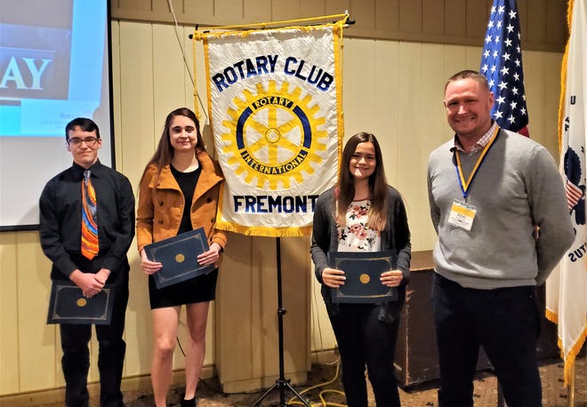 Pictured at the Fremont Rotary meeting, from left to right, are Jesse Layne, Vanguard Career & Tech Center; Abigail Swartzfager, Terra State Community College; Daniella Ortiz, Fremont Ross High School; and Roger Kuns, Fremont Rotary Club President and Marine Corps Veteran.