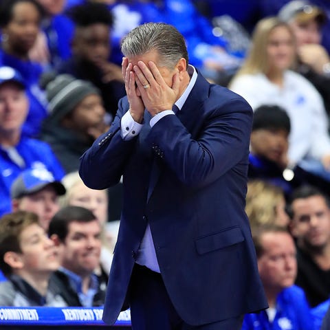 Kentucky coach John Calipari reacts to a mistake b