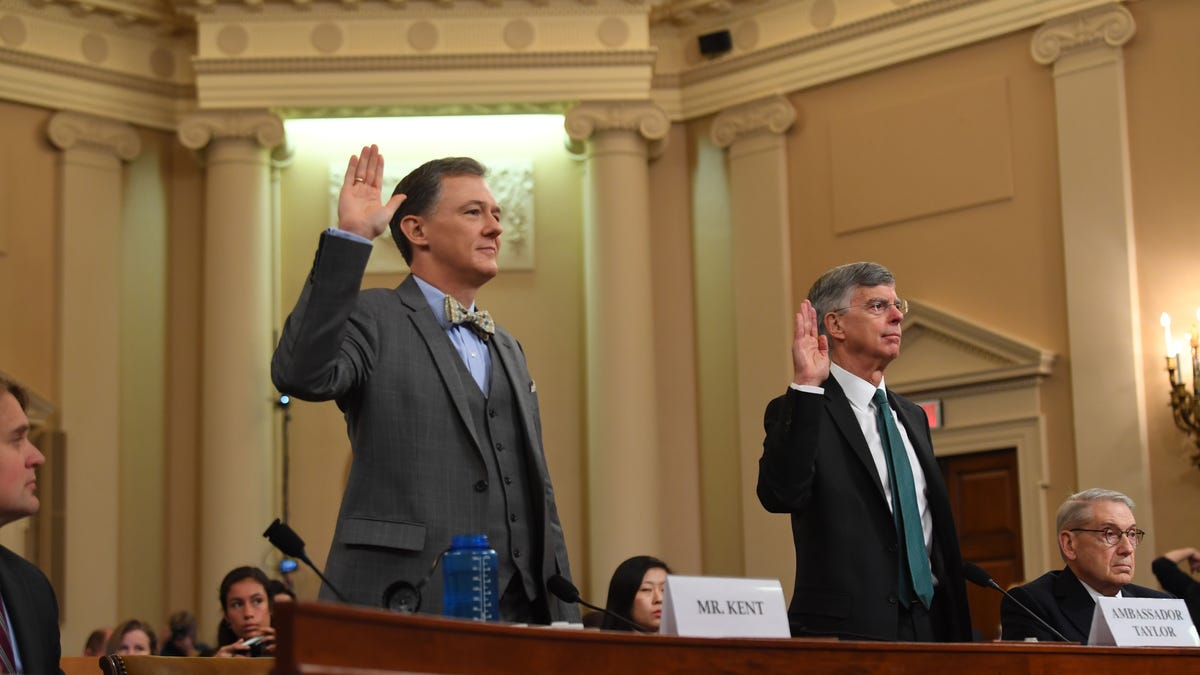 State Department Ukraine-Russia expert George Kent, left, and William B. Taylor, Jr., the top American diplomat in Ukraine are sworn in ahead of testifying before the Permanent Select Committee on Intelligence as the first witnesses in public congressional hearings in the impeachment inquiry into allegations President Donald Trump on Nov 13, 2019.