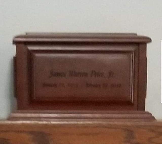 An urn with the name James Warren Price Jr. was among items stolen out of a traveler's vehicle recently in Great Falls, according to police.