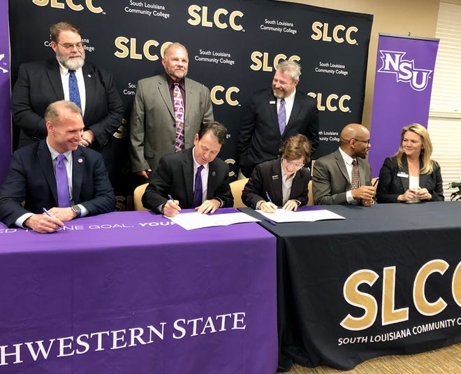 South Louisiana Community College and Northwestern State University officials sign an agreement Thursday creating a pathway from SLCC's associate degree program in civil survey and mapping to NSU's bachelor degree program in resource management with a concentration in GEO computation at NSU.