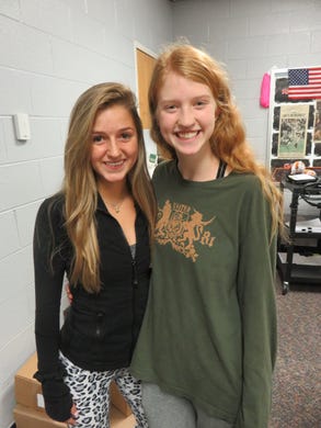 West High cross country team members Elisabeth Bernard, left, and Macy Kraslawsky, who are shown at the school on Nov. 11, recently completed their careers that included qualifying for the state meet three times.