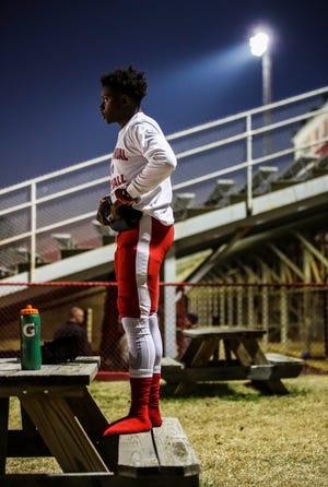 "I never get nervous," said Manual's Gilbert Robbins, a sophomore receiver, as he gets ready before the game against St. X for the Class 6A Playoffs Friday night at Manual's Memorial Stadium. "I don't worry about the crowd. I just focus on my team." Nov. 15, 2019