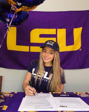 LSU sophomore All-American gymnast Olivia Dunne, shown here when she signed with LSU while in high school in Hillsdale, New Jersey, is expected to profit from a proposed new law in Louisiana that would allow athletes to profit from their name, image and likeness.