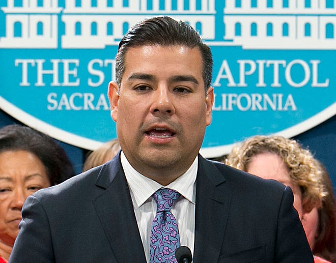 In this May 31, 2017, file photo, then-state Sen. Ricardo Lara, now the California Insurance Commissioner, speaks at a Capitol news conference in Sacramento.
