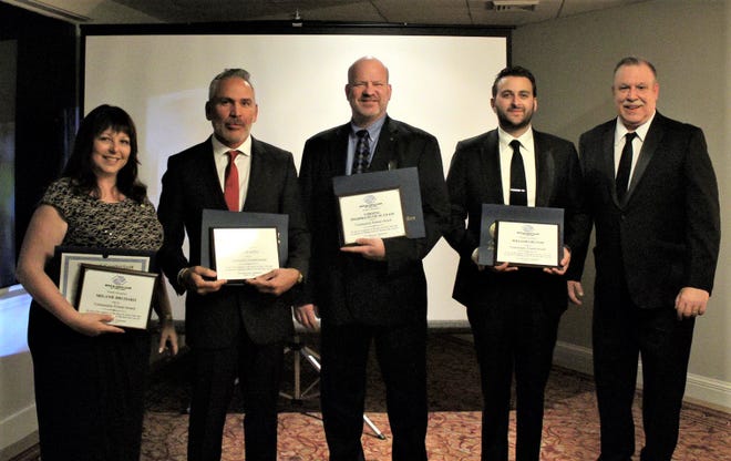 (From left) Melanie Druziako of Tri-County Rotary Club, Caleb Soto of DeSoto Jewelers, John Heery of Corning Pharmaceutical Glass, and William Gruccio, president of Renati Solutions, who are joined by Chris Volker, executive director, Boys & Girls Club of Vineland, were recognized with Community Awards during the club’s 15th Anniversary Gala and Masquerade Ball.