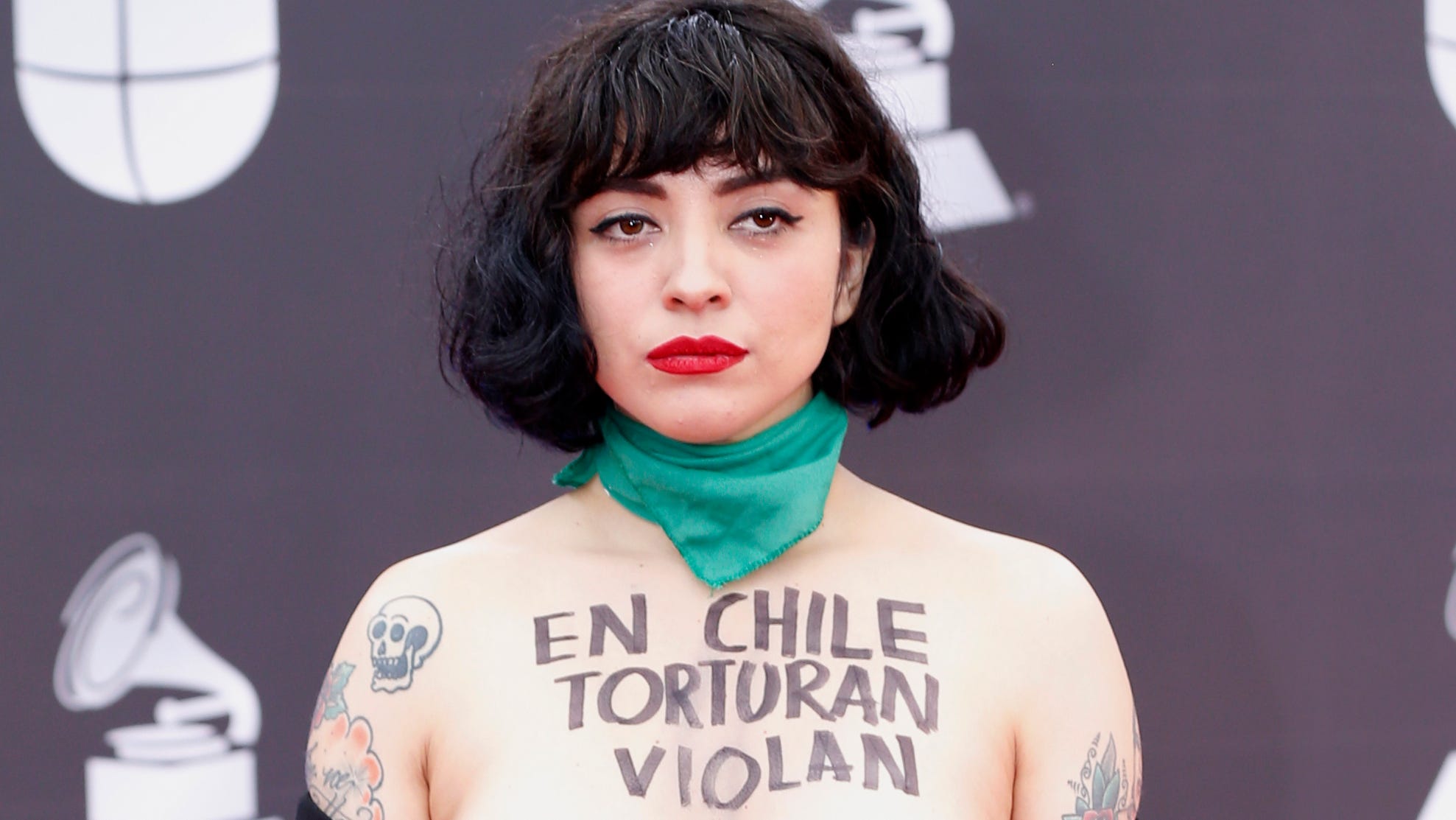Latin Grammys Mon Laferte Exposes Bare Chest In Political Protest