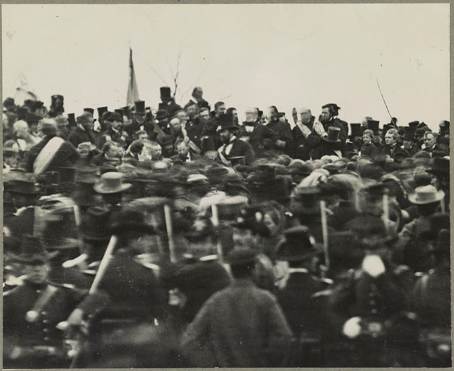 One of the two confirmed photos of President Abraham Lincoln (center, facing camera) at Gettysburg, taken about noon, just after he arrived and some three hours before his speech.
