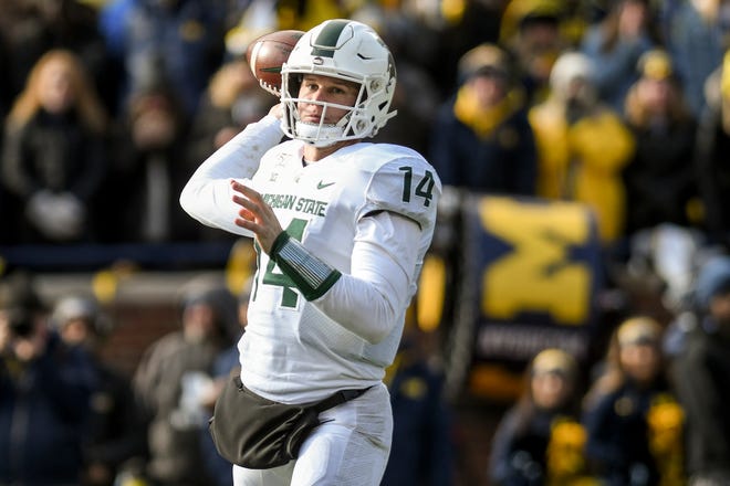 Michigan State's Brian Lewerke throws a pass during the second quarter on Saturday, Nov. 16, 2019, at Michigan Stadium in Ann Arbor. When the Spartans return for their final home game Nov. 30, tickets are selling for as little as $5.
