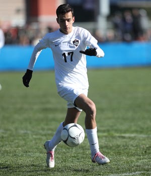 Rye's Ata Arslan (17) works the ball in the NYSPHSAA boys Class A soccer semi-finals against Jericho  at Middletown High School on Saturday, November 16, 2019.
