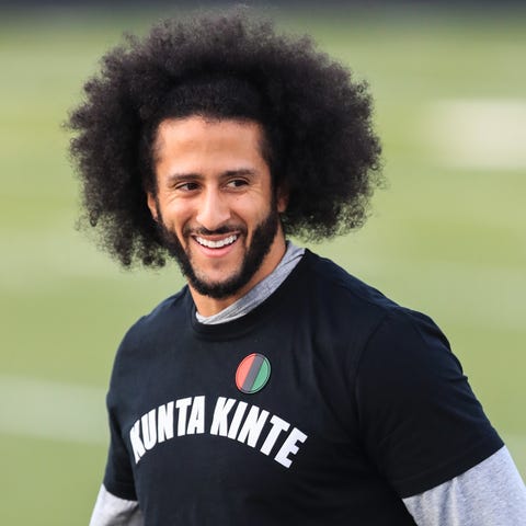Colin Kaepernick looks on during a private NFL wor