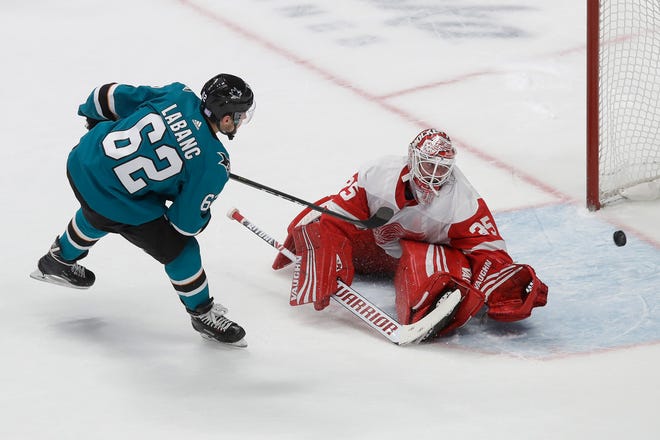 San Jose Sharks right wing Kevin Labanc (62) scores past Detroit Red Wings goaltender Jimmy Howard in the shootout.