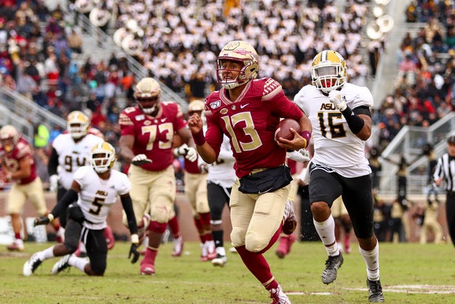 Quarterback Jordan Travis used his feet to get things done for Florida State's offense during a majority of the 2020 football season.