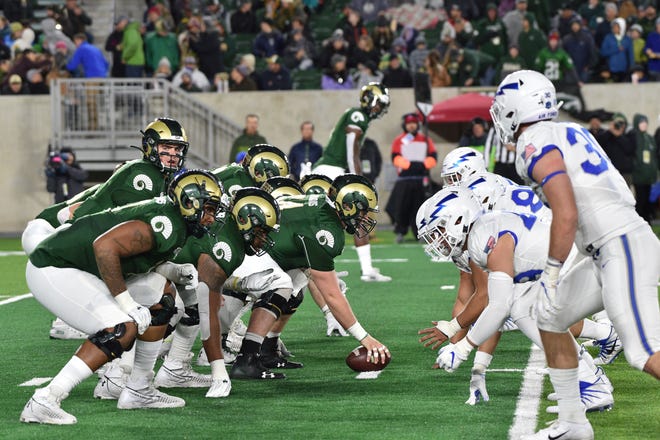 Nov 16, 2019; Fort Collins, CO, USA; Colorado State Rams quarterback Patrick O'Brien (12) check the Air Force Falcons defense at Sonny Lubick Field at Canvas Stadium.