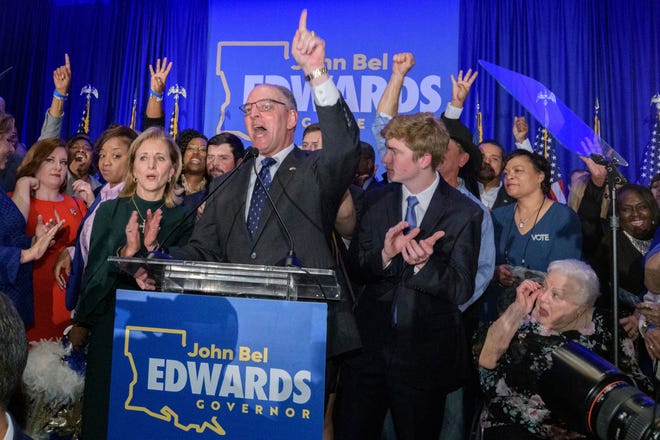 Louisiana Gov. John Bel Edwards, who defeated Republican Eddie Rispone to win a second term, addresses supporters at his election night watch party Saturday in Baton Rouge, La., Saturday, Nov. 16, 2019. (AP Photo/Matthew Hinton)