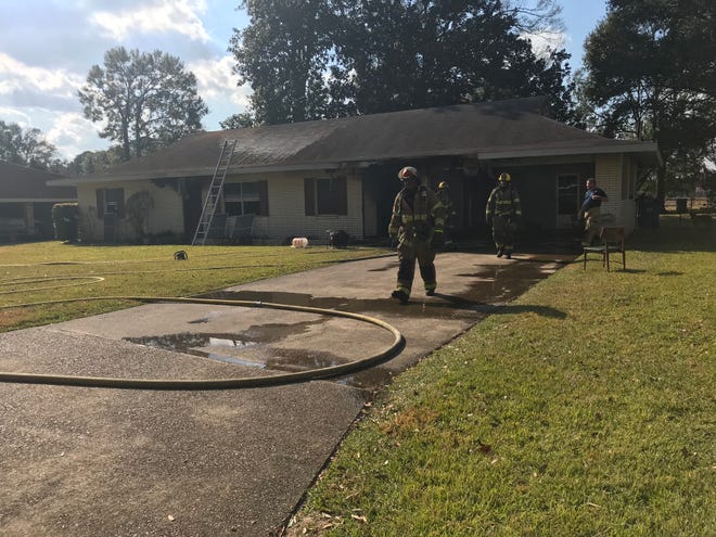 Lafayette firefighters extinguish a fire Monday on Ridgeview Drive.