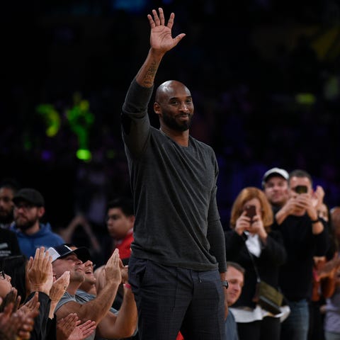Kobe Bryant acknowledges the crowd during the seco