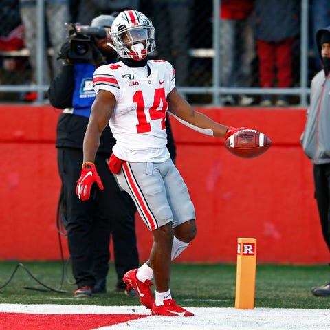 Ohio State wide receiver K.J. Hill reacts after sc