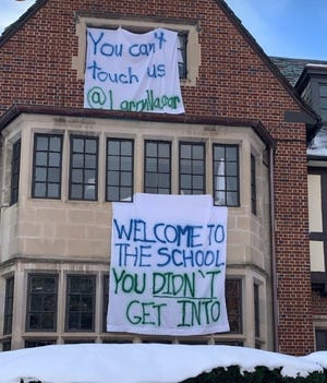 The Psi Upsilon chapter at the University of Michigan has faced criticism over a banner that referenced serial sex abuser Larry Nassar.