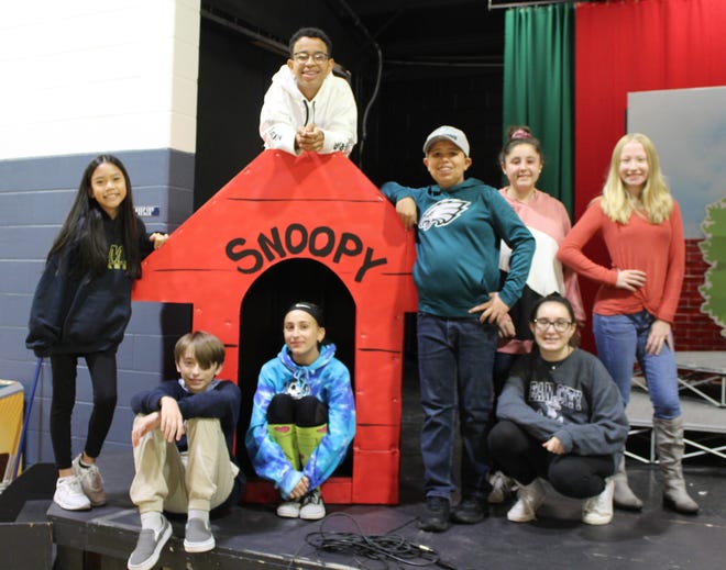 The cast of St. Mary School’s production of “You’re a Good Man Charlie Brown” includes: (seated, from left) Keith Sawyer as Charlie Brown; Nicoletta Giuliani as Lucy; Emily Gove as Marci/Narrator; and (standing, from left) Christine Lam, chorus; Lorezo Lopes as Snoopy; Stephen Horvath as Schroeder; Sofia Pepe, chorus; and Jessica Taylor as Sally.