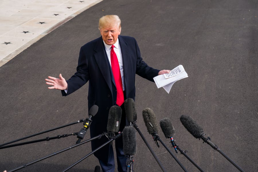 President Donald Trump speaks to the media about the impeachment proceedings on the South Lawn of the White House on Nov. 20, 2019. Trump recounted Ambassador Sondland's testimony, repeatedly saying 'I want nothing' in return for aid to Ukraine.