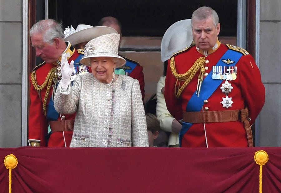 Britain's Queen Elizabeth II (L) and Prince Andrew (R) stand on the balcony of Buckingham Palace on Jun. 8, 2019.