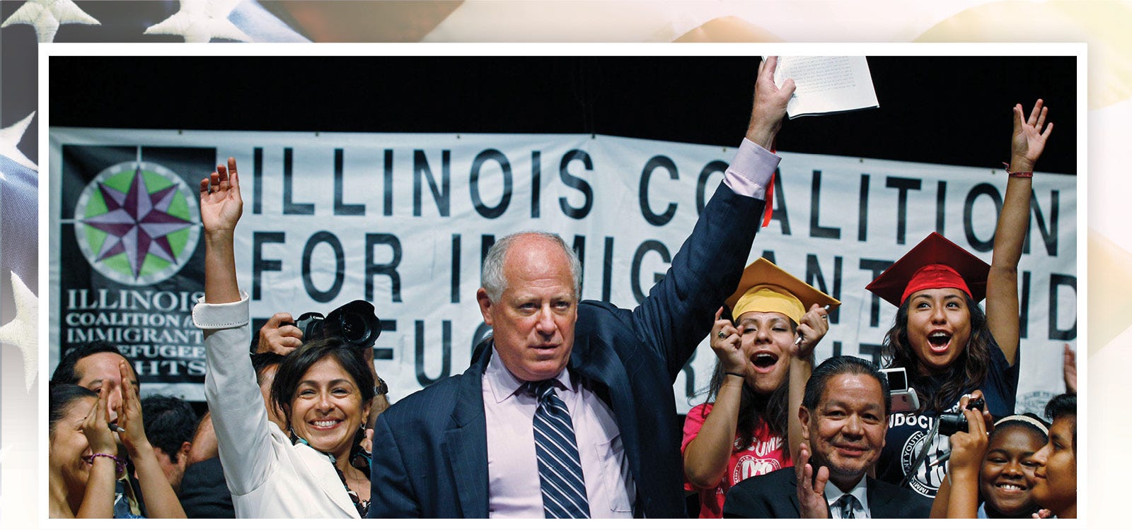 Then-Illinois Gov. Pat Quinn celebrates with students and supporters after signing the Illinois Dream Act into law, Aug. 1, 2011, at a Latino neighborhood high school in Chicago. The Illinois law gave undocumented immigrants access to private scholarships for college.