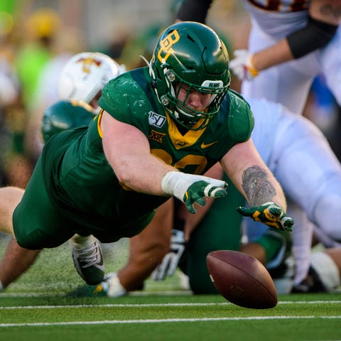 Baylor Bears defensive tackle James Lynch recovers