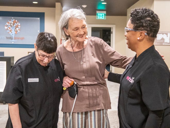 Avanti caregivers Patricia Crochet, left, and Wilnell Simoneaux, right, talk to Lynda Wooldridge. Avanti is a new senior care facility in Lafayette.