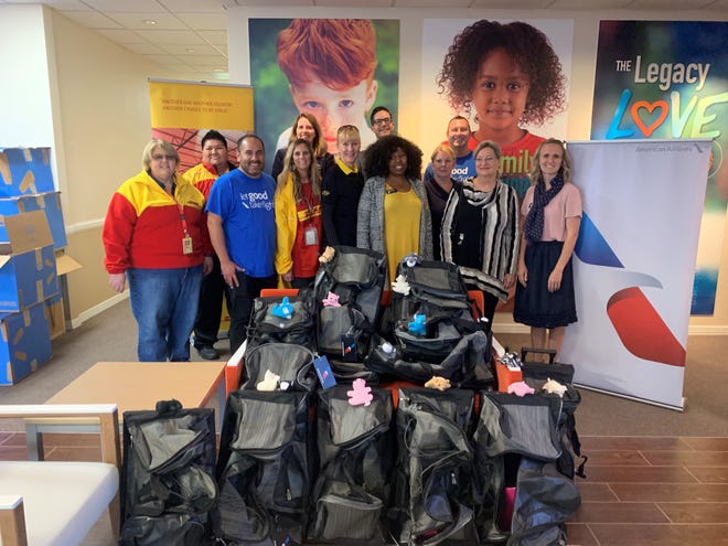 DHL and American Airlines employees came together to donate bags to Child Crisis Arizona on Nov. 21, 2019.