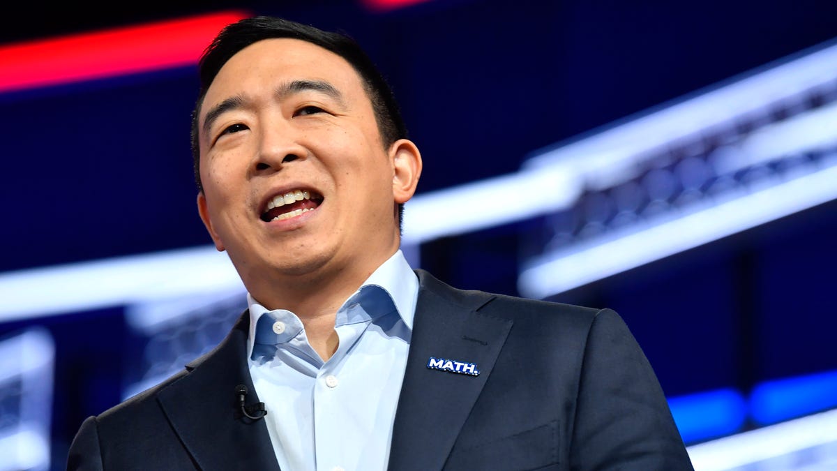 Democratic presidential candidate former technology executive Andrew Yang walks onto the stage before the Democratic presidential primary debate in Atlanta. 