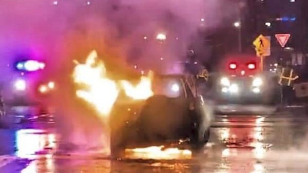 Man saves stranger from burning car