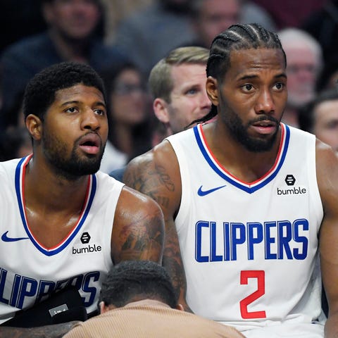 Paul George and Kawhi Leonard on the Clippers' ben